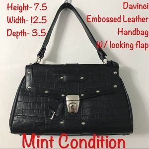 Davinci embossed leather purse.